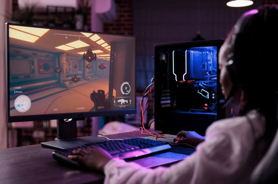 girl playing video games on pc
