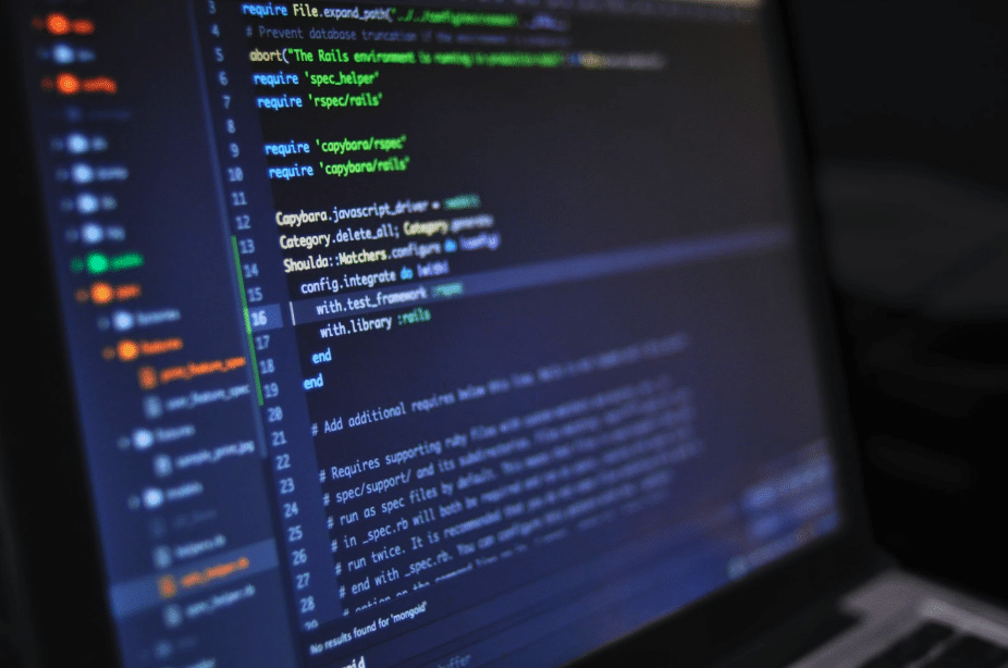 laptop screen displaying code