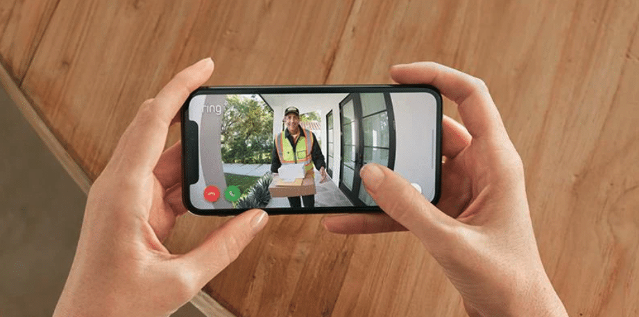 person viewing ring camera footage on phone