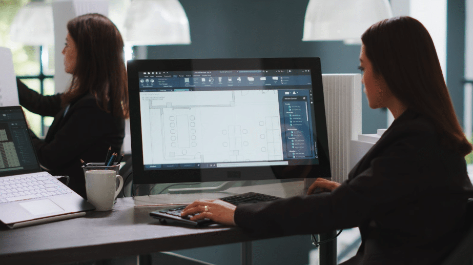 woman at computer using software